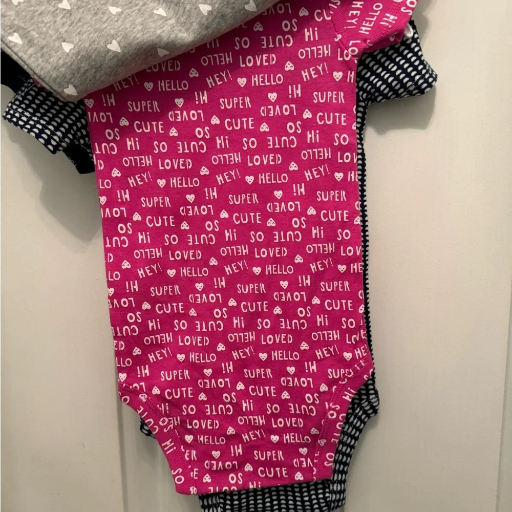 NWT set of 4 CARTER’S ONSIES. Baby Size 9 months Brand New still on hangers NEW - Picture 1 of 12